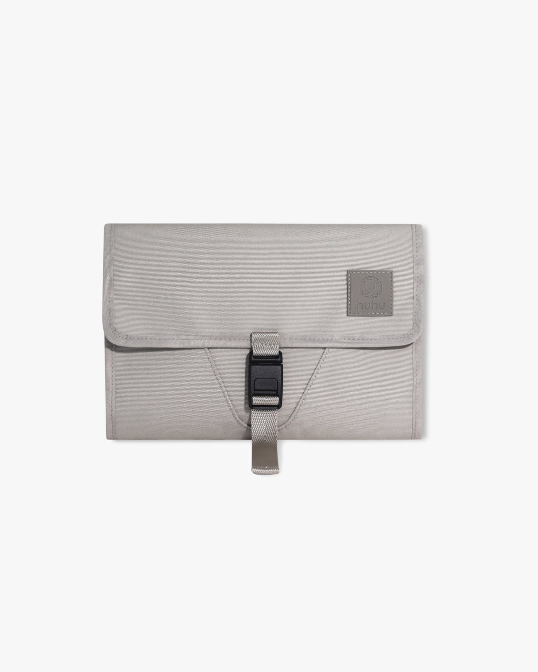 Taupe changing wallet against white background.
