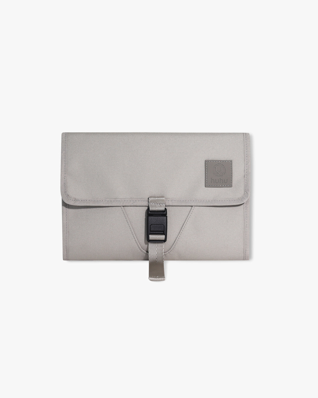 Taupe changing wallet against white background.