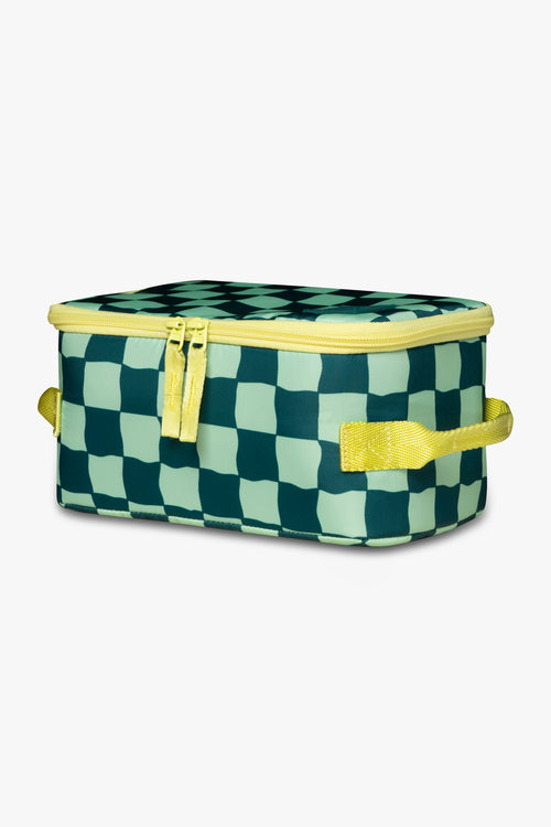 Side angle view of green checkered insulated cooler bag with yellow zipper against a white background.