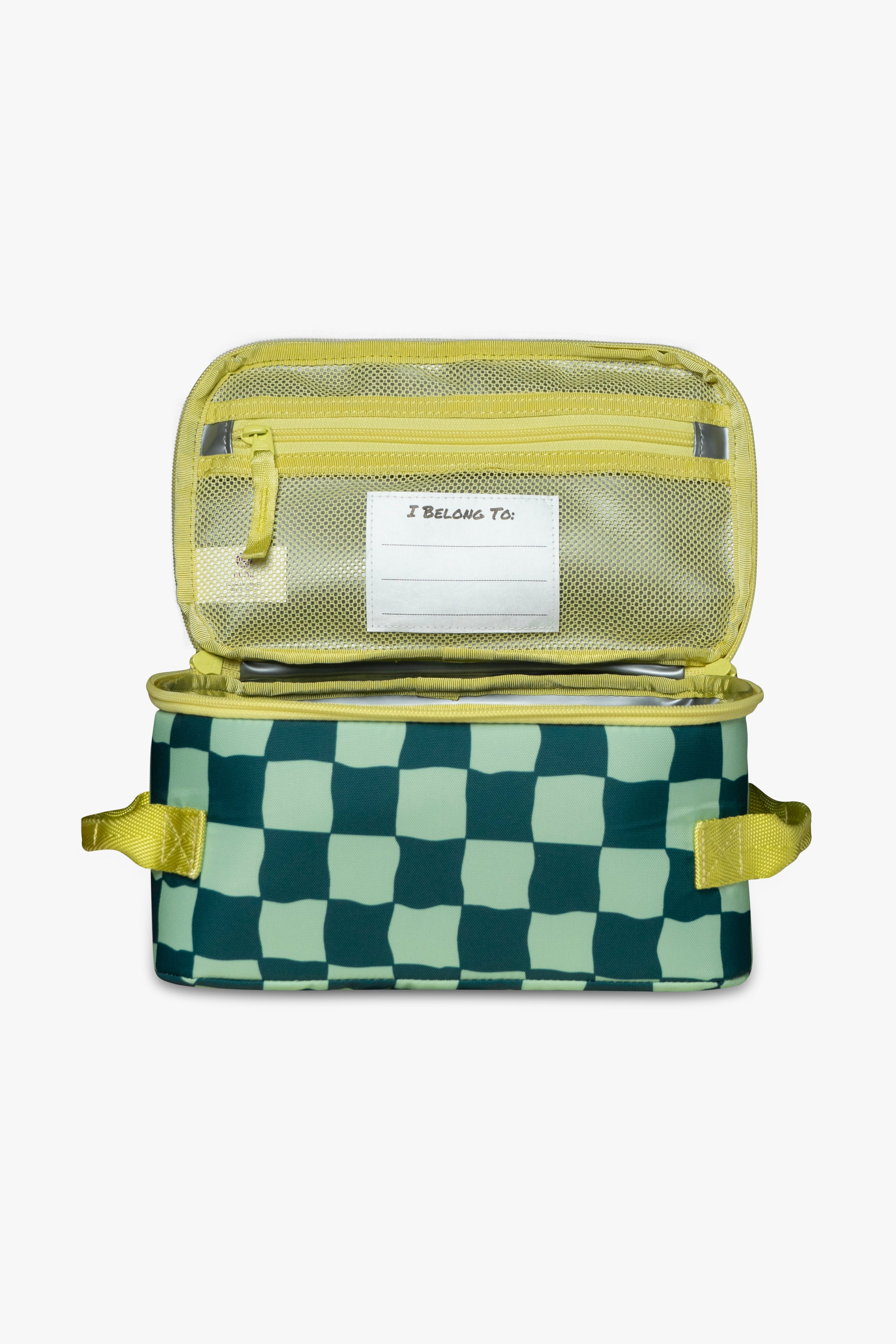 Front view of open green checkered insulated cooler bag to reveal yellow mesh zippered pocket and white "I belong to" tag against a white background.