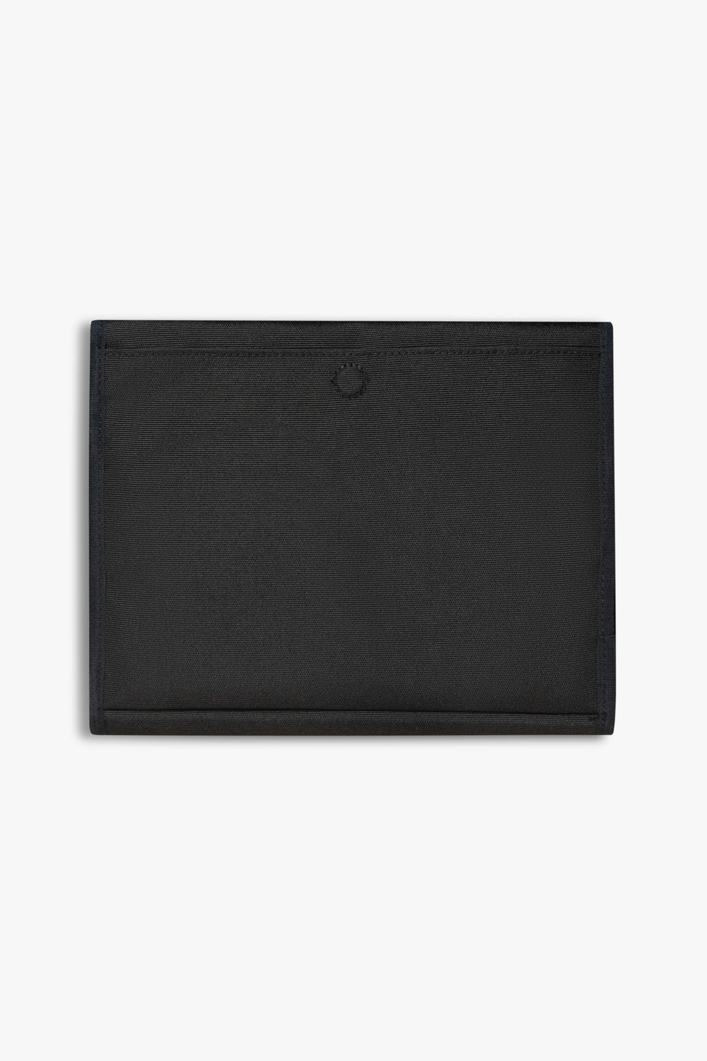 Back view of closed black changing wallet against a white background showing back, magnetic changing pad pocket.
