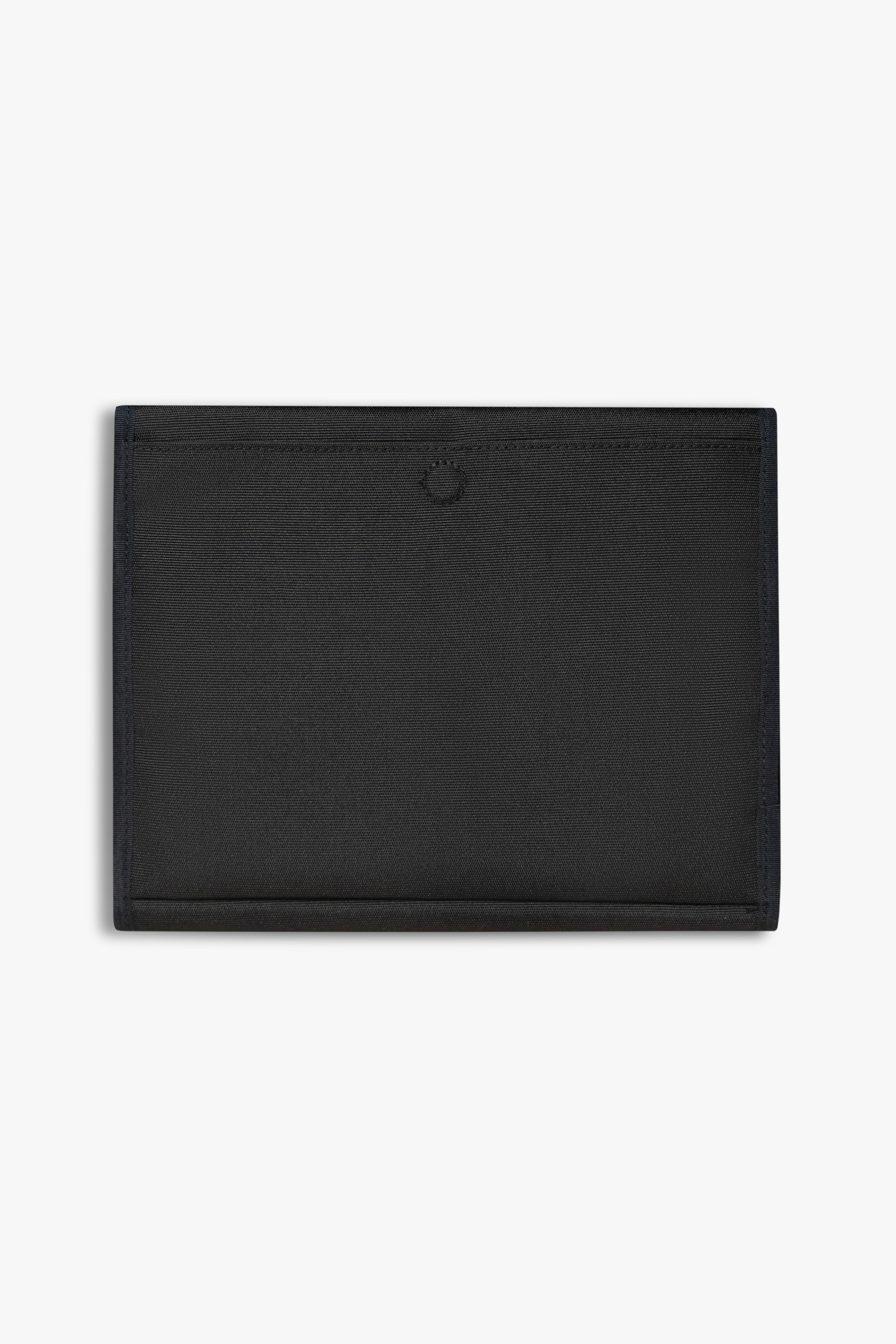 Back view of closed black changing wallet against a white background showing back, magnetic changing pad pocket.