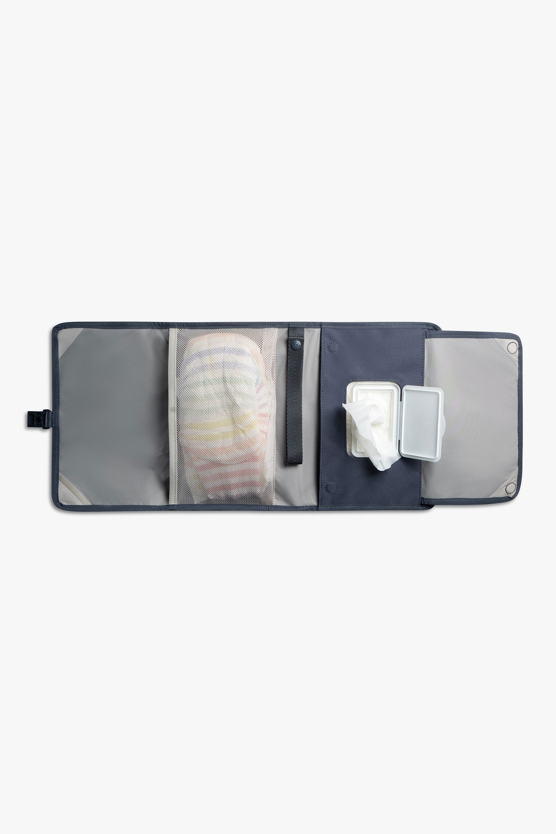 Front view of horizontal opened blue changing wallet with taupe interior against a white background. Shows diapers in a taupe mesh pocket, a blue strap, and wipes in a designated wipes pocket.