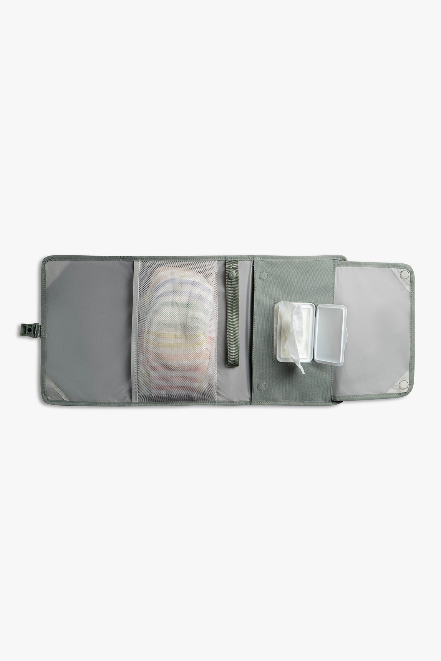 Front view of horizontal opened green changing wallet with taupe interior against a white background. Shows diapers in a taupe mesh pocket, a green strap, and wipes in a designated wipes pocket.